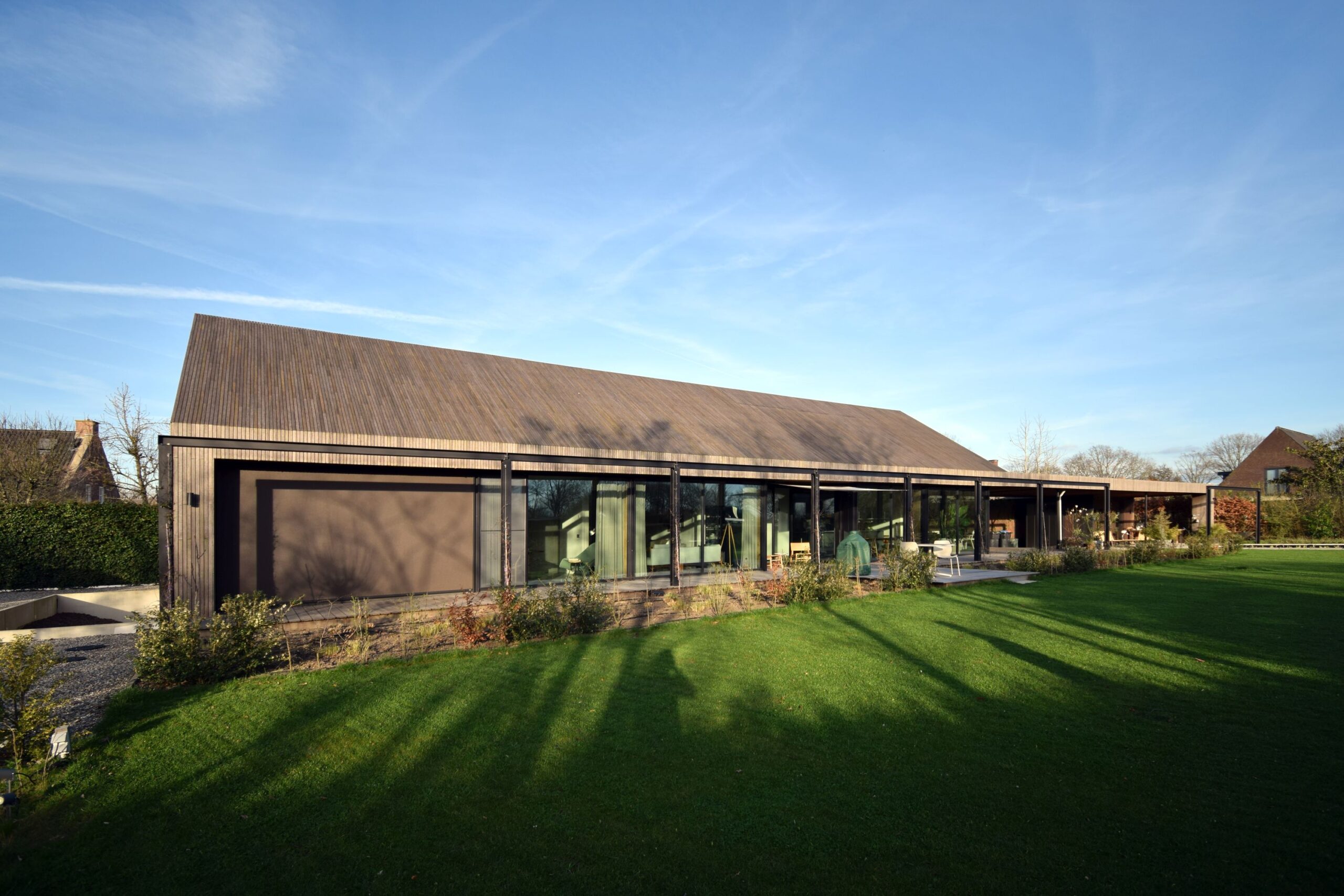 Achtergevel duurzame houten schuurwoning afgewerkt met bamboo Awood genomineerd voor de Tilburg architectuurprijs 2026